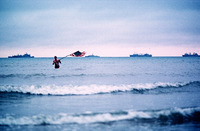Dawn, along Omaha Beach, June 6, 1994 - ©2024 David Burnett.<br/>All rights reserved.