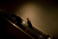 Barack Obama, running for President 2008 makes his way up an escalator - ©2025 David Burnett.<br/>All rights reserved.