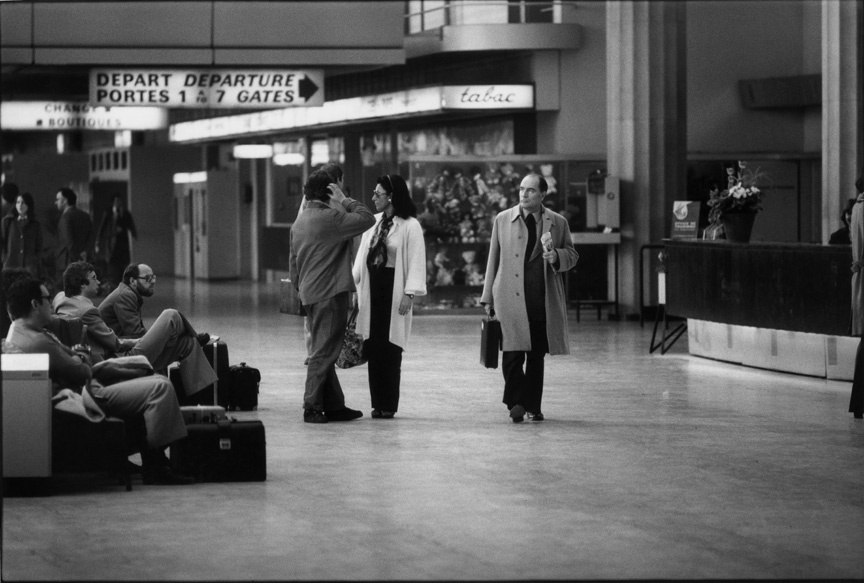 Going unnoticed through le Bourget airport, Francois Mitterrand (later to be President) strolls nonchalantly : Too Close UMFA : David Burnett | Photographer