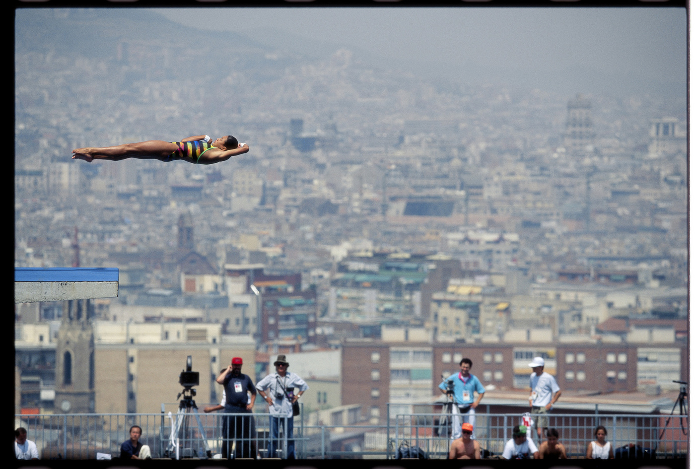 Chinese Gold medalist Fu Minh Xia leaps from the 10 meter platform, Barcelona Olympics 1992 : Too Close UMFA : David Burnett | Photographer