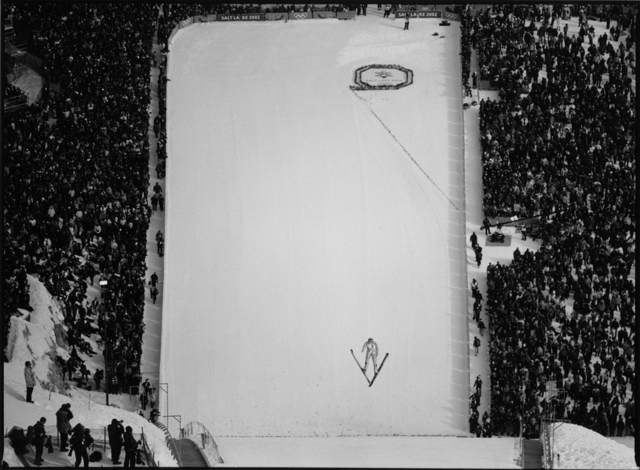 A lone ski jumper leaps off the big hill, Park City Utah, 2002 Olympics : Too Close UMFA : David Burnett | Photographer