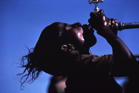 A sip of water: the Korem refugee camp, Ethiopia - ©2024 David Burnett.<br/>All rights reserved.