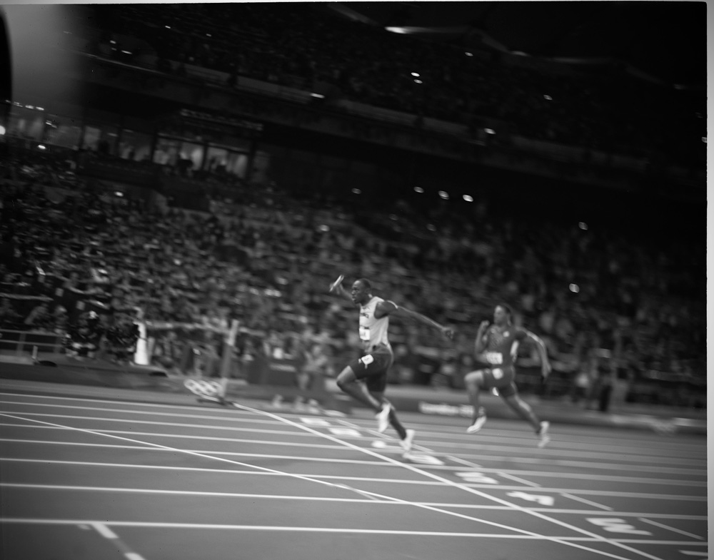 Usain Bolt powers Jamaica's 4x100 relay team to Victory : London 2012 / Olympics : David Burnett | Photographer