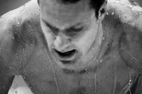 A swimmer leaves the water behind - ©2025 David Burnett.<br/>All rights reserved.