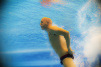 A diver surfaces - ©2025 David Burnett.<br/>All rights reserved.