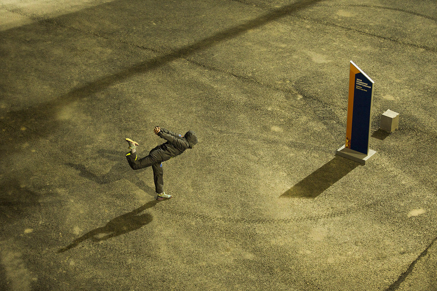 A solitary woman ski jumper warms up before the precedent setting first competition.  ©2014 David Burnett/IOC : Sochi 2014 - the Winter Games : David Burnett | Photographer