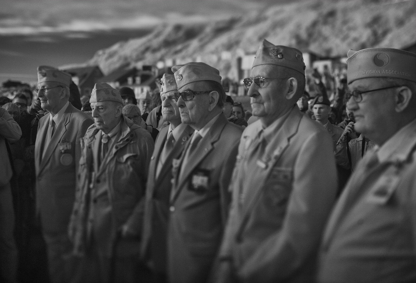 Members of the 29th Division gather at Dog/Red on Omaha beach, 0700, 70 years after D-Day to salute their fallen comrades