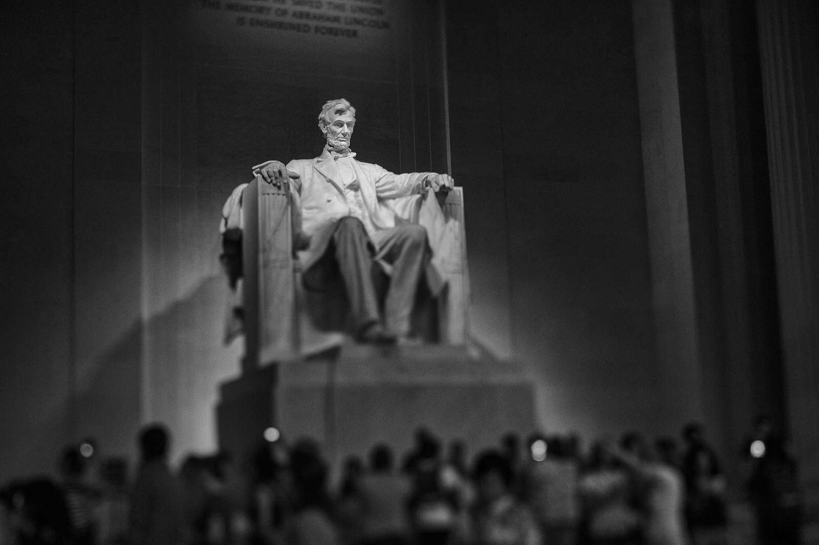 The Lincoln Memorial, a giant statue of Lincoln looks out across the Mall