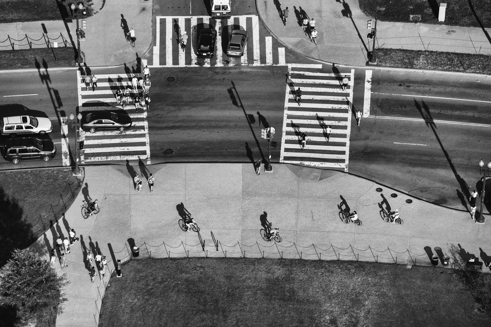 Cyclists mingle with pedestrians near the base of the Washington Monument
