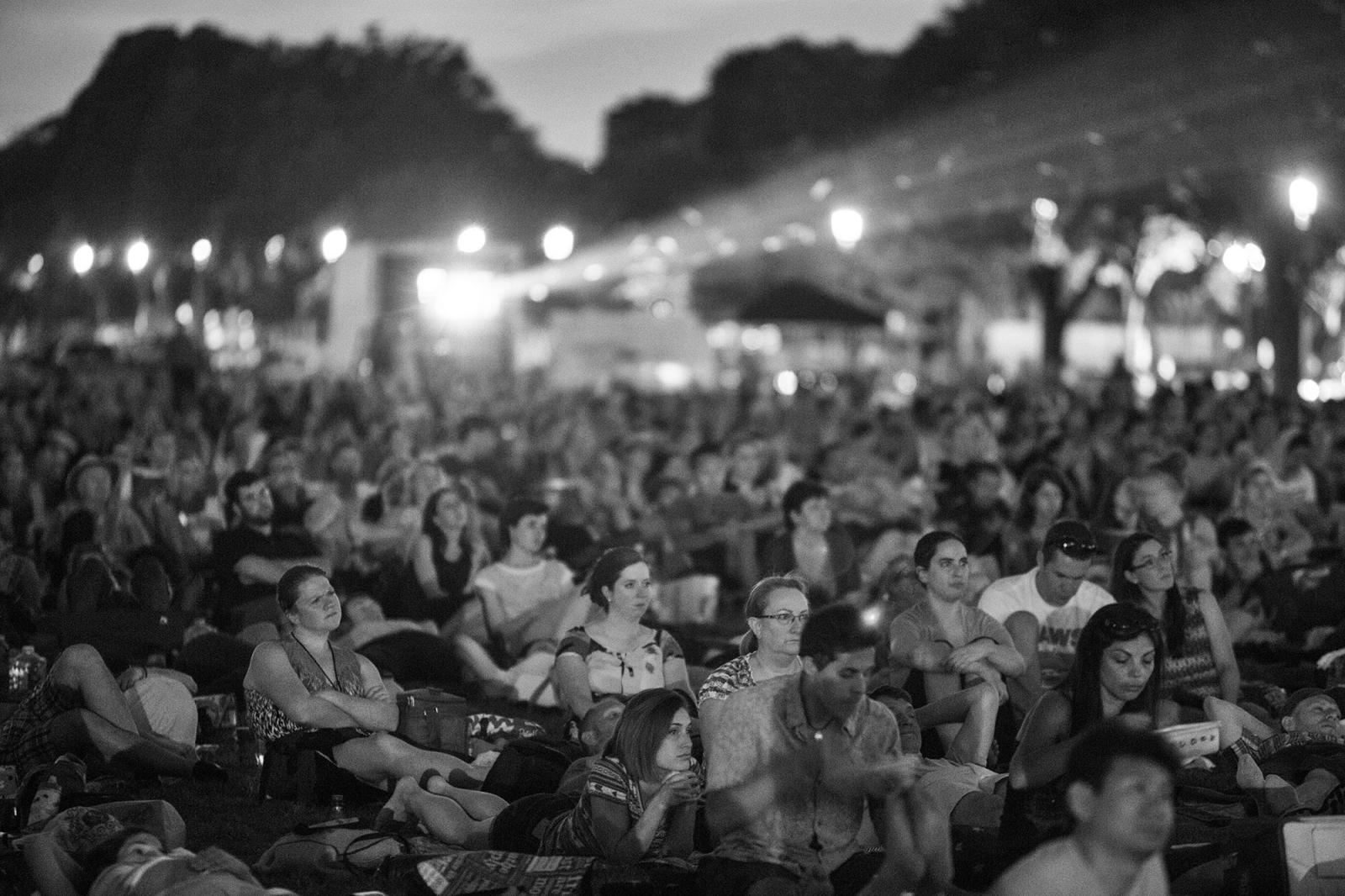 A film shown late on a summer's night to thousands who come to the Mall for "Movie" night : The National MALL : David Burnett | Photographer