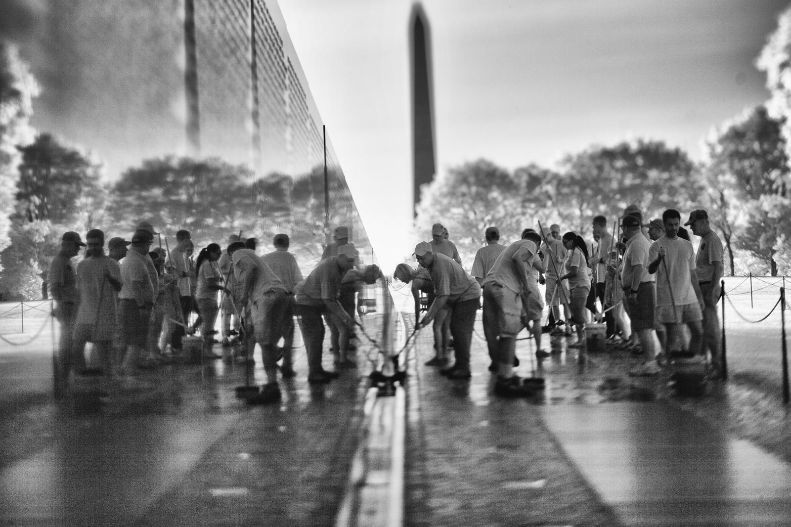 Vietnam War vets, and other friends, scrubbing and washing "the Wall"