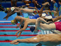 Each swimmer has his own way of starting - ©2025 David Burnett.<br/>All rights reserved.