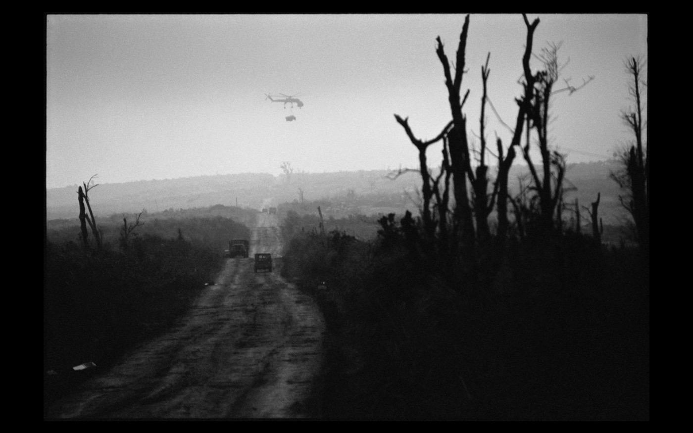 A US Army helicopter delivering supplies to Khe Sahn  Vietnam 1971 : Looking Back: 60 Years of Photographs : David Burnett | Photographer