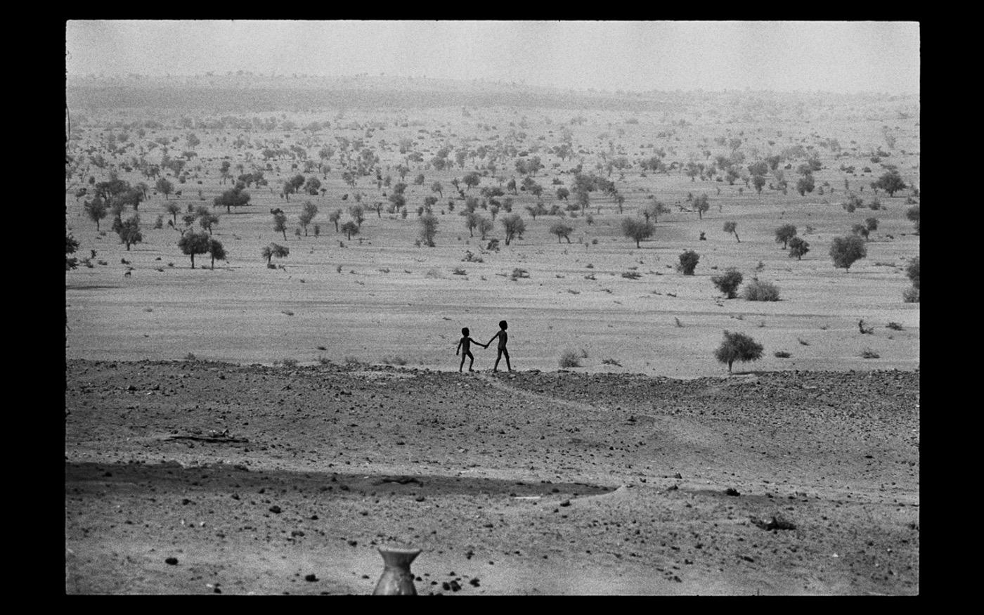 Two village children in the Niger bush, where drought created terrible living conditions in the sub-Sahara : Looking Back: 60 Years of Photographs : David Burnett | Photographer