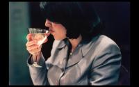 Former White House intern Monica Lewinsky sips a cosmo at Mortons/DC following the explosive news of her affiar with Bill Clinton 1998 - ©2024 David Burnett.<br/>All rights reserved.