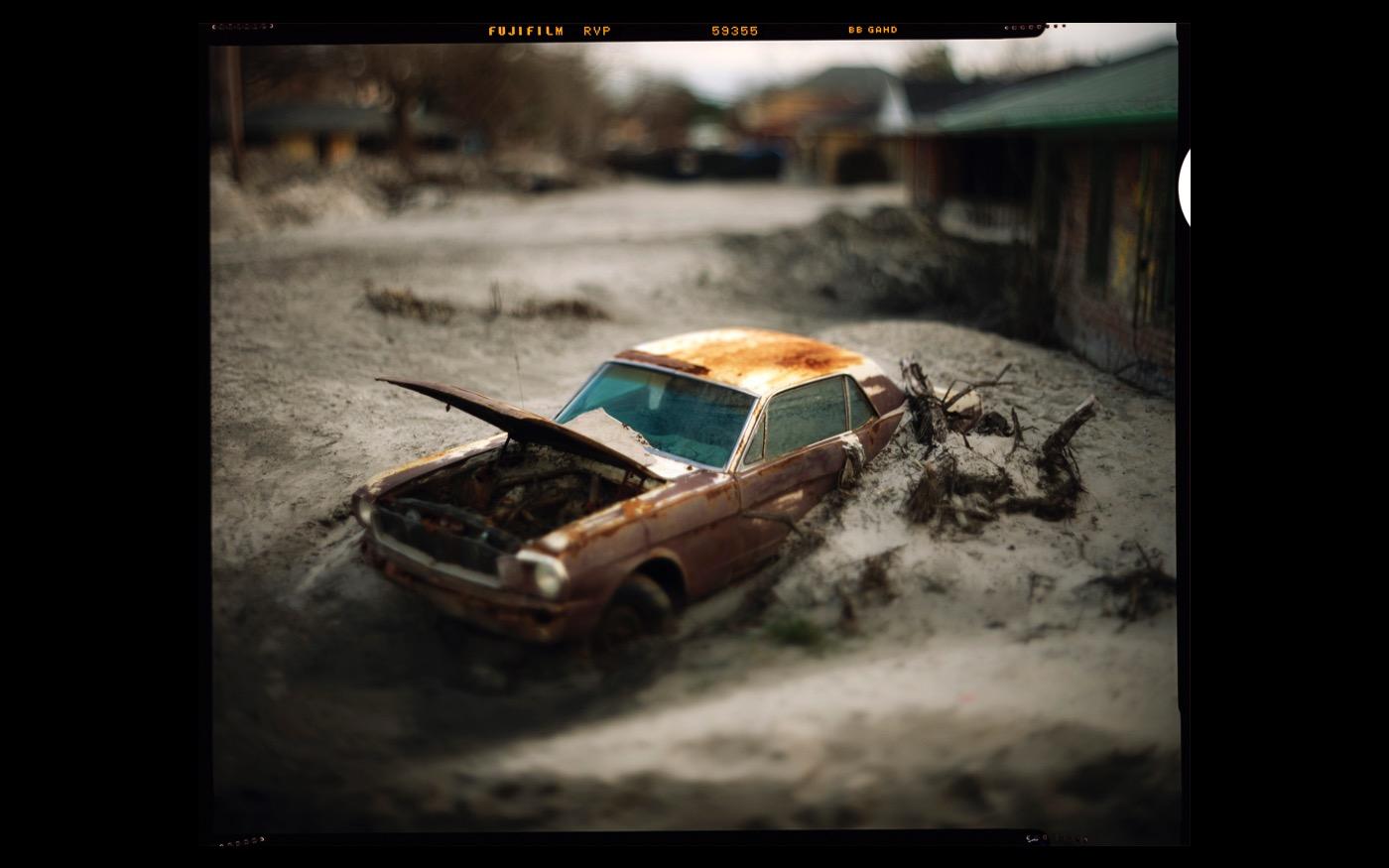 In the aftermath of Hurricane Katrina, entire neighborhoods were inundated with walls of sand and dirt  2006 : Looking Back: 60 Years of Photographs : David Burnett | Photographer