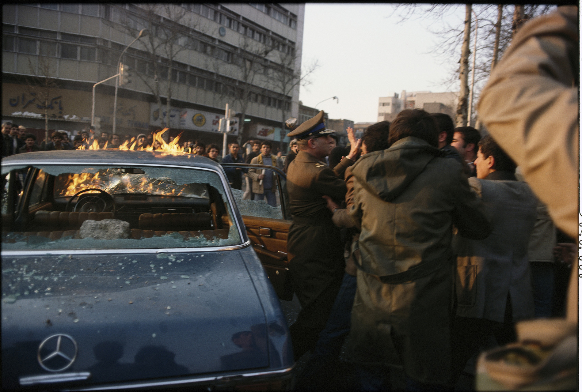 The assault and murder of Gen. Latifi, of the Iranian Army, by a mob near the University. : 44 Days: the Iranian Revolution : David Burnett | Photographer