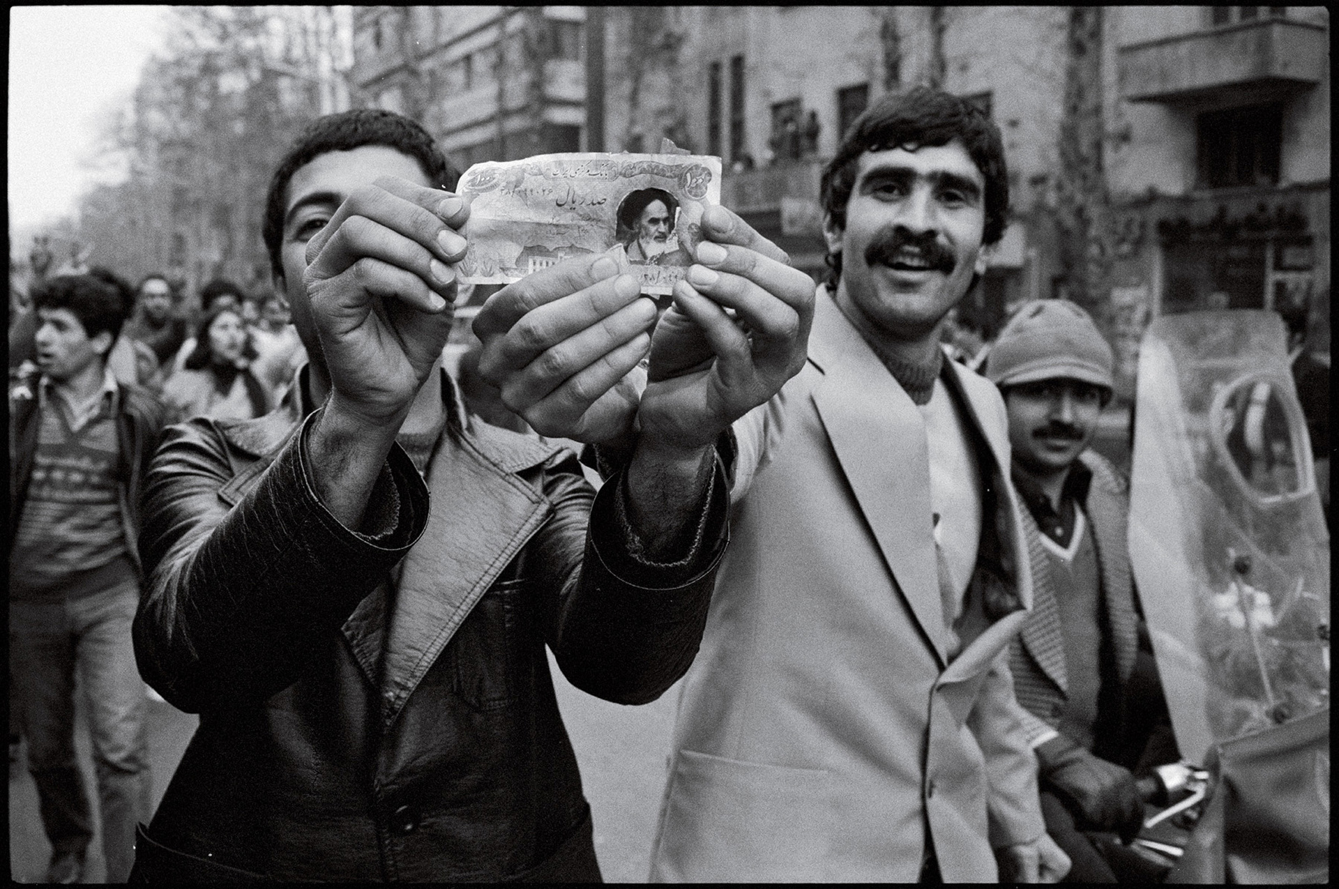 Tehran erupts in joy, with news of the Shah's departure.