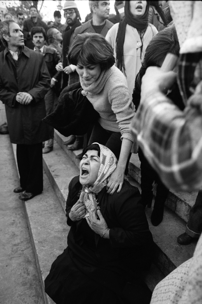 Mourners at a funeral for an anti-Shah demonstrator.