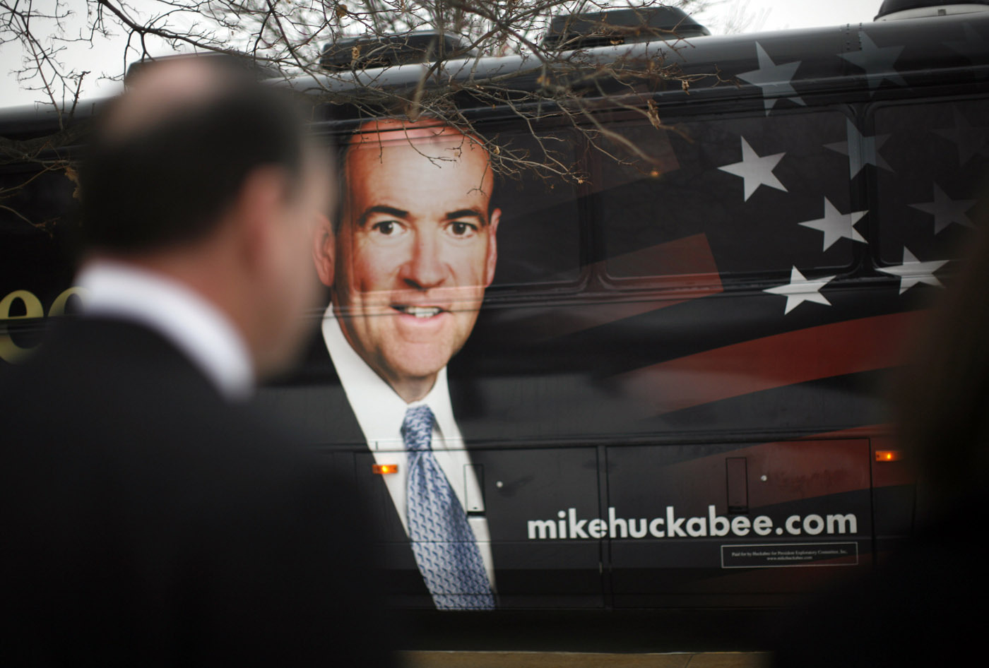 Mike Huckabee & bus, Iowa : The Presidents  : David Burnett | Photographer