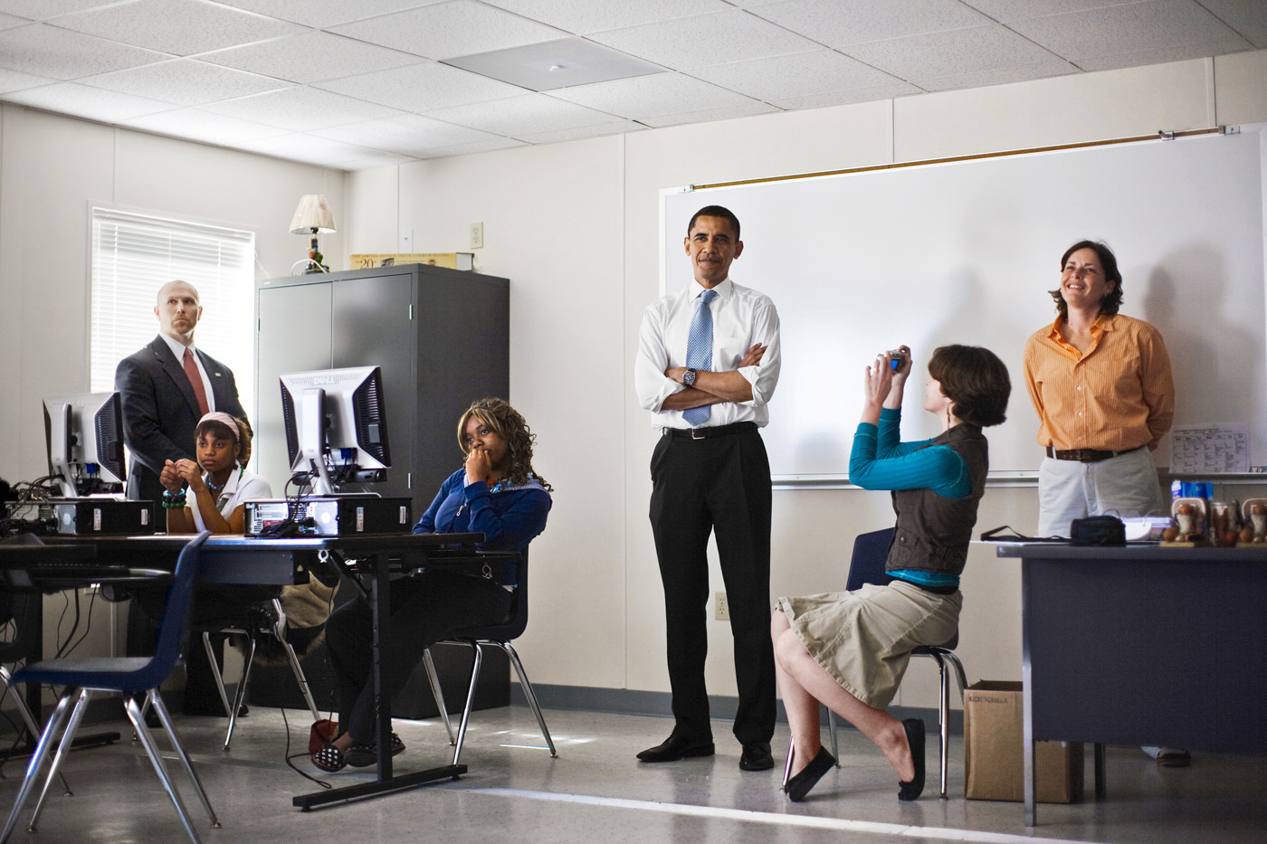 Obama campaigns in a New Orleans school