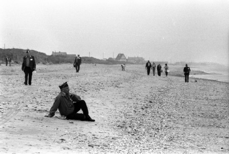A vet sits on Omaha Beach, 35 years after D-Day