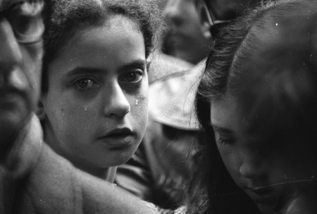 Leila Nash (13)_ and her friend Amanda Fernandez (15) at the funeral of Pablo Neruda