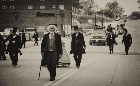 Frederick Douglass and Lincolns walk on the main street of Vandalia.