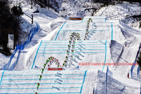 Ski Cross, the Gold (L) and Silver Medalists (R) race to the finish